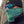 Load image into Gallery viewer, man wearing green neck gaiter by Hook Life
