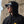 Load image into Gallery viewer, young man in Water Camo fishing cap by Hook Life on sea wall
