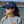 Load image into Gallery viewer, young woman wearing Anglers Pride Skipper fishing cap by Hook Life at a harbor
